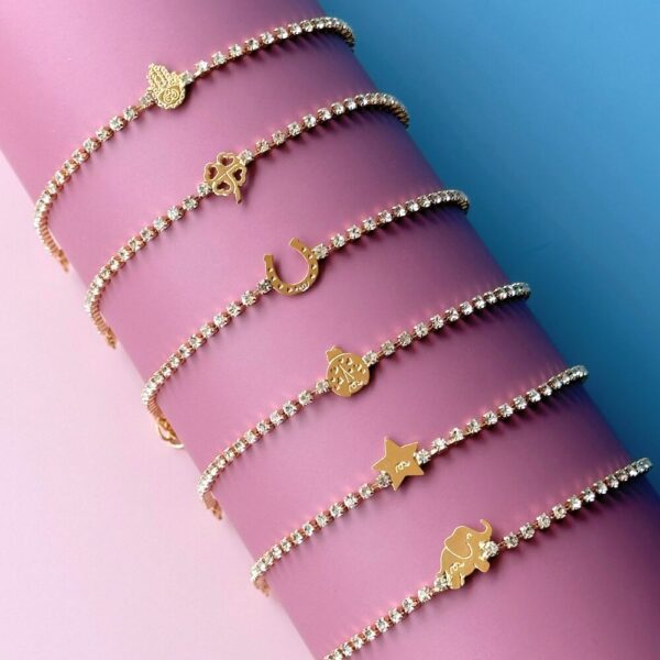 Bracciale Tennis Lucky SerenaBi in oro 18kt con ciondoli portafortuna e zirconi, regolabile 16โ20 cm